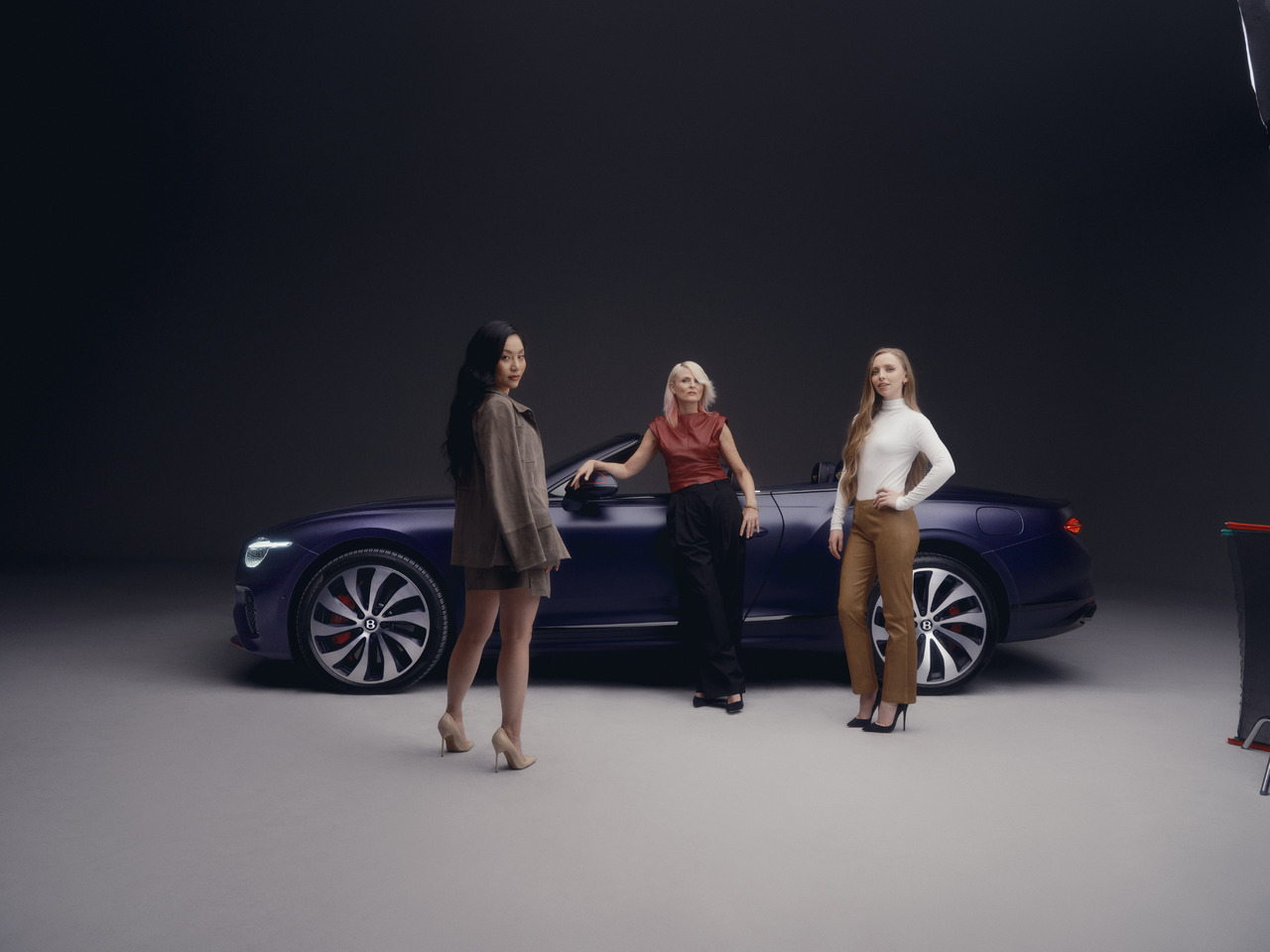 Außergewöhnliche Frauen komponieren ihren harmonischen Bentley.